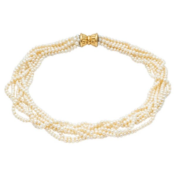 Mesure et art du temps - 18k Yellow Gold 7 Strands Fine Pearls Necklace Clasp Necklace of pearls finished 7 Rows twisted. Clasp with two safeties in 18k yellow gold. Diameter of the pearls: 0,4 cm Width: 1 cm Length : 51,5 cm