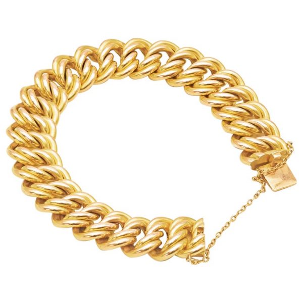 Mesure et art du temps - Bracelet, Armlet, en Or Jaune 18 Carats avec Chainette Armlet avec un fermoir et une chainette pour sécuriser le bracelet à votre poignet. Largeur : 1,6 cm Longueur : 20 cm