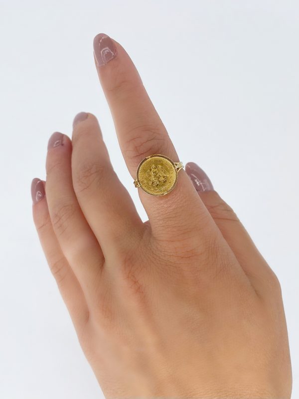 Mesure et art du temps - Solid 18k gold ring, eagle head hallmark, set with a gold coin of Dos Pesos Mexicanos, with the effigy of an eagle "Estados Unidos Mexicanos", dated 1945, 20th century. Size : 54 FR; 6,75 US; N UK