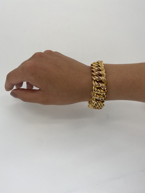 Mesure et art du temps - Bracelet, Armlet, en Or Jaune 18 Carats avec Chainette Armlet avec un fermoir et une chainette pour sécuriser le bracelet à votre poignet. Largeur : 1,6 cm Longueur : 20 cm