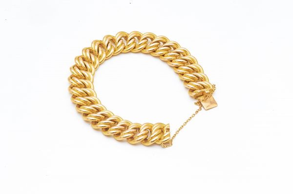 Mesure et art du temps - Bracelet, Armlet, en Or Jaune 18 Carats avec Chainette Armlet avec un fermoir et une chainette pour sécuriser le bracelet à votre poignet. Largeur : 1,6 cm Longueur : 20 cm