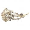 Mesure et art du temps - Antique brooch trembling Flower articulated White Gold 18 carats platinium and old Diamonds. Antique brooch with a flower on its stem in white gold and platinum set with old diamonds. A clasp with a double security ensures its maintenance during use. Length 6 cm Width : 2,5 cm