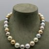 Tahitian Pearl Necklace 18K Yellow Gold Necklace of 29 Tahitian Pearls with a 18k Yellow Gold buy clasp. Size 14/15 mm Silky and bright dresses. Triple A classification. Natural pastel color.